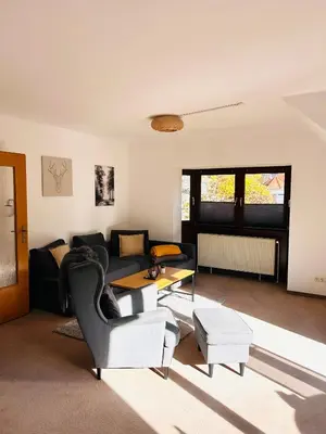 Ein Sitzbereich in der Unterkunft Apartment am Park
