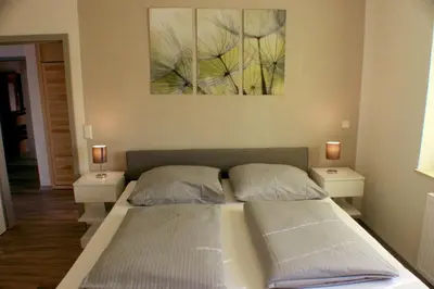 Ein Bett oder Betten in einem Zimmer der Unterkunft Ferienwohnungen Rittergasse