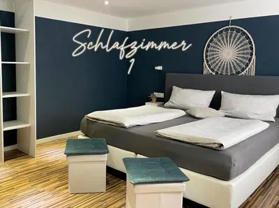 Ein Bett oder Betten in einem Zimmer der Unterkunft Ferienwohnung 1-4 Personen in Goslar