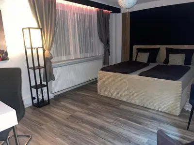 Ein Bett oder Betten in einem Zimmer der Unterkunft Ferienwohnung 1-4 Personen in Goslar