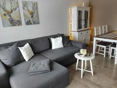 Ein Sitzbereich in der Unterkunft Ferienwohnung Rehkitz
