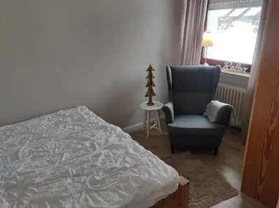 Ein Bett oder Betten in einem Zimmer der Unterkunft Ferienwohnung Rehkitz