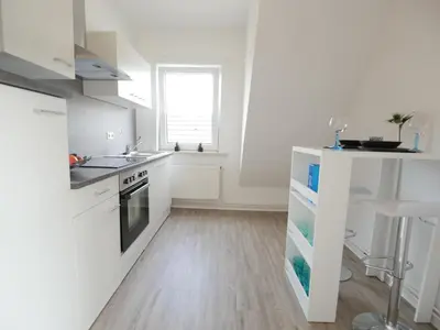 Küche/Küchenzeile in der Unterkunft EUPHORAS - Gemütliches Apartment in zentraler Lage