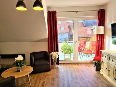 Ein Sitzbereich in der Unterkunft Ferienwohnungen Burgfried