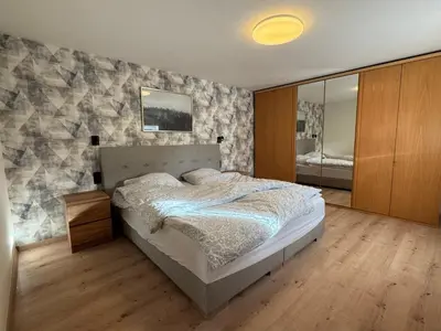 Ein Bett oder Betten in einem Zimmer der Unterkunft Bergmannsruh OG