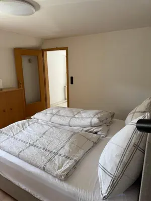Ein Bett oder Betten in einem Zimmer der Unterkunft Bergmannsruh OG