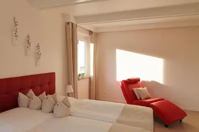 Ein Bett oder Betten in einem Zimmer der Unterkunft Der Buchenhof