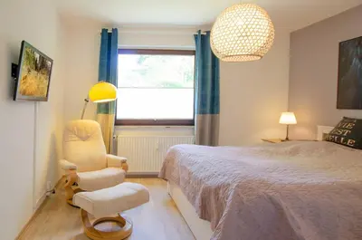 Ein Bett oder Betten in einem Zimmer der Unterkunft FeWo Rosi