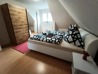 Ein Bett oder Betten in einem Zimmer der Unterkunft Appartement am Westerntor III