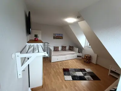 Ein Bett oder Betten in einem Zimmer der Unterkunft Appartement am Westerntor III