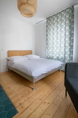 Ein Bett oder Betten in einem Zimmer der Unterkunft Klein aber OHO!