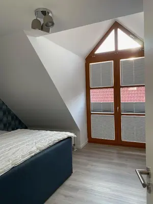 Ein Bett oder Betten in einem Zimmer der Unterkunft Harzzeit Home