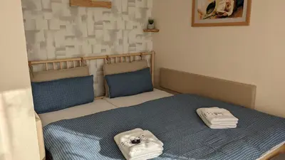 Ein Bett oder Betten in einem Zimmer der Unterkunft WeisseVilla Friedrichsbrunn Das Weisse Haus