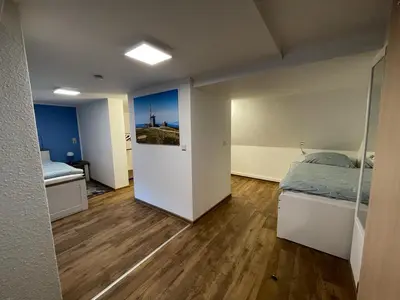 Ein Bett oder Betten in einem Zimmer der Unterkunft Ferienhaus Harzcolor Wernigerode