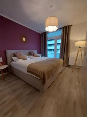 Ein Bett oder Betten in einem Zimmer der Unterkunft Berg-Blick-Fewo