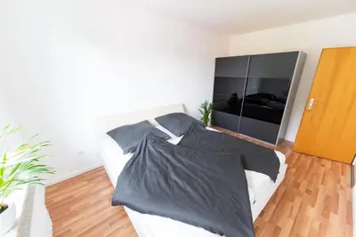Ein Bett oder Betten in einem Zimmer der Unterkunft Ferienwohnung Martin 3 und 4