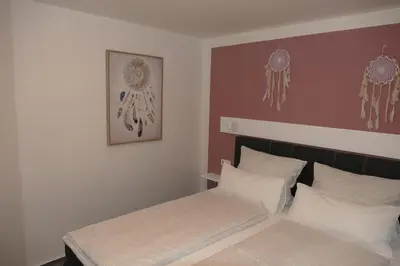 Ein Bett oder Betten in einem Zimmer der Unterkunft Harzapart Appartement 2 