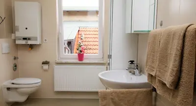 Ein Badezimmer in der Unterkunft Amys Ferienwohnungen Bad Harzburg