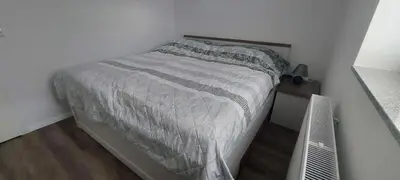 Ein Bett oder Betten in einem Zimmer der Unterkunft FeWoReinel mit 2 Schlafzimmern