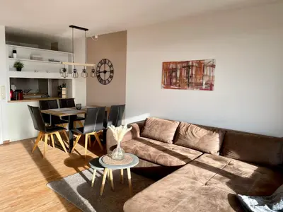 Ein Sitzbereich in der Unterkunft Schöne Ferienwohnung mit Schwimmbad, Sauna und Balkon