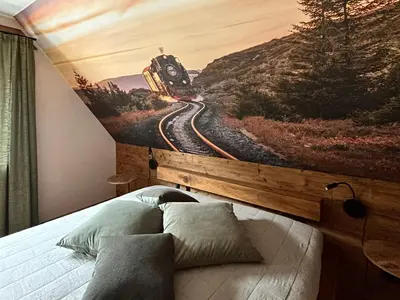 Ein Bett oder Betten in einem Zimmer der Unterkunft Ferienhaus Harzglück