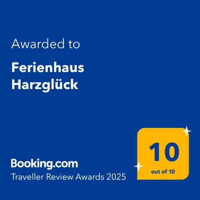 Ein Zertifikat, Auszeichnung, Logo oder anderes Dokument, das in der Unterkunft Ferienhaus Harzglück ausgestellt ist