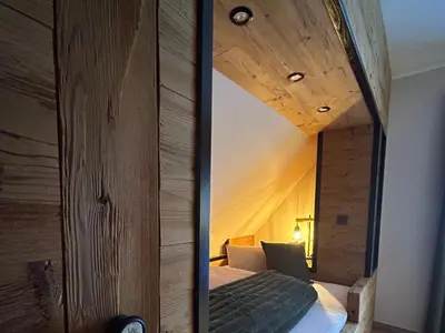 Ein Bett oder Betten in einem Zimmer der Unterkunft Ferienhaus Harzglück