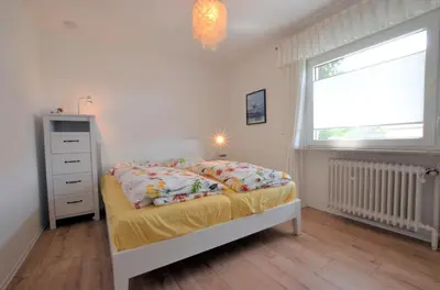 Ein Bett oder Betten in einem Zimmer der Unterkunft Ferienhaus Frederic