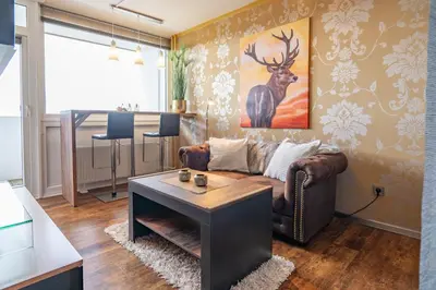 Ein Sitzbereich in der Unterkunft Ferienwohnung Kleine Lotusblüte
