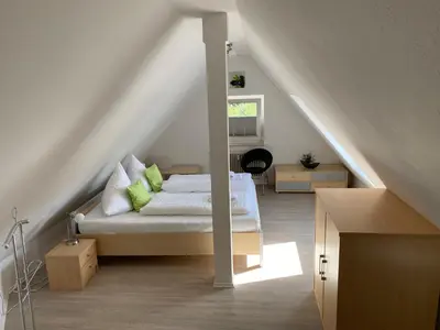 Ein Bett oder Betten in einem Zimmer der Unterkunft Steinmännchen Ferienwohnung
