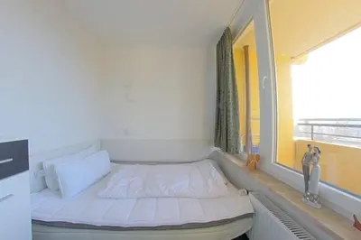 Ein Bett oder Betten in einem Zimmer der Unterkunft Apartment 422