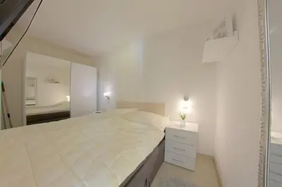 Ein Bett oder Betten in einem Zimmer der Unterkunft Apartment 422