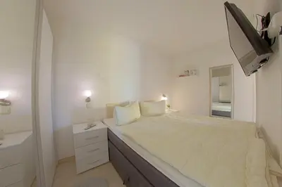 Ein Bett oder Betten in einem Zimmer der Unterkunft Apartment 422