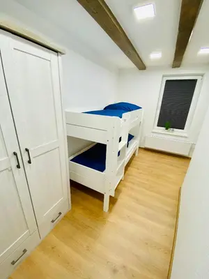 Ein Bett oder Betten in einem Zimmer der Unterkunft FeWo Lebenslust mit Whirlpoolbadewanne #Innenstadt#Außenbereich von Harztraveler