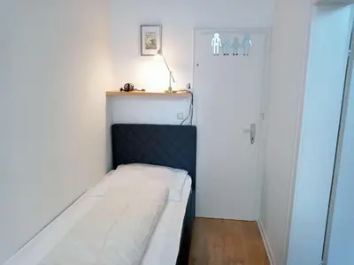 Ein Bett oder Betten in einem Zimmer der Unterkunft FeWo Radau