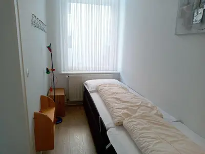 Ein Bett oder Betten in einem Zimmer der Unterkunft FeWo Radau