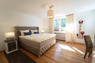 Ein Bett oder Betten in einem Zimmer der Unterkunft RoLigio Ferienhaus