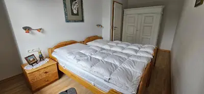 Ein Bett oder Betten in einem Zimmer der Unterkunft Fewo Esche 1