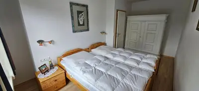 Ein Bett oder Betten in einem Zimmer der Unterkunft Fewo Esche 1