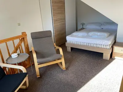 Ein Bett oder Betten in einem Zimmer der Unterkunft Apartment an der Mühle in Wernigerode /Hasserode