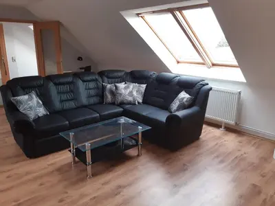 Ein Sitzbereich in der Unterkunft Ferienwohnung Günther am Park