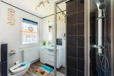 Ein Badezimmer in der Unterkunft Ferienhaus Peggy mit Klimaanlage in den Bergen