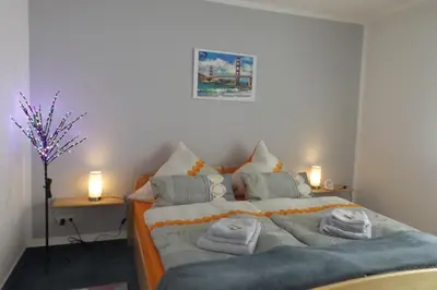 Ein Bett oder Betten in einem Zimmer der Unterkunft Ferienwohnung Simon