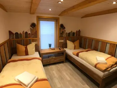 Ein Bett oder Betten in einem Zimmer der Unterkunft Ferienwohnung - Haus Molle