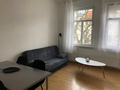 Ein Sitzbereich in der Unterkunft Helles Apartment