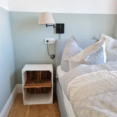 Ein Bett oder Betten in einem Zimmer der Unterkunft Villa am Paulsberg