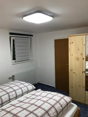 Ein Bett oder Betten in einem Zimmer der Unterkunft Cozy Braunlage