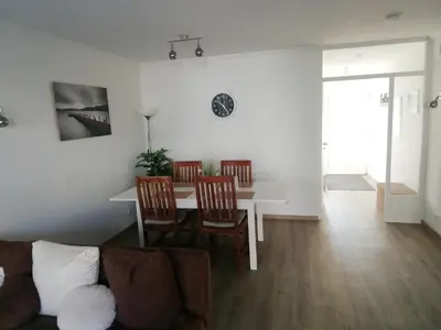 Ein Sitzbereich in der Unterkunft Ferienwohnung Löwenzahn