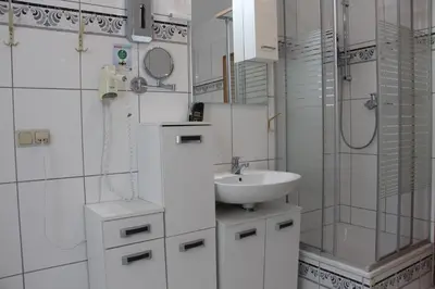 Ein Badezimmer in der Unterkunft REGIOHOTEL Aparthotel Wernigerode - #Ferienwohnungen #Familienfreundlich #Harzurlaub #Freeparking