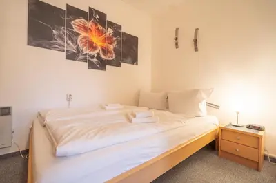 Ein Bett oder Betten in einem Zimmer der Unterkunft Brockenhexe